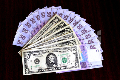 dollar and grivnas banknotes