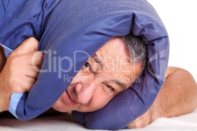 Man lying in bed and can not sleep