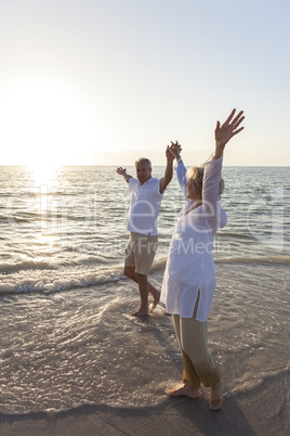 Happy Senior Couple Walking Holding Hands Tropical Beach