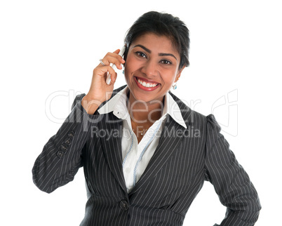 Indian woman talking on phone.