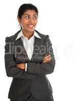 Indian businesswoman hands folded looking side.