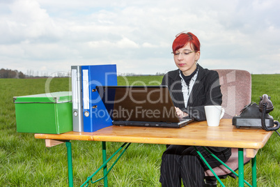 Businesswoman working in the free