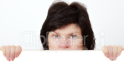Woman stands behind the board