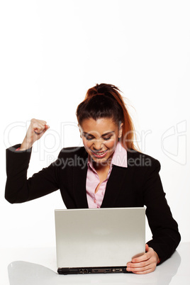 frustrated woman punching her laptop