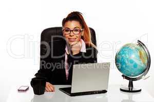 businesswoman sitting in ago office