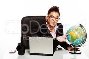 businesswoman with a world globe
