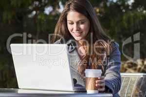 Young Woman Girl Using Laptop Drinking Coffee