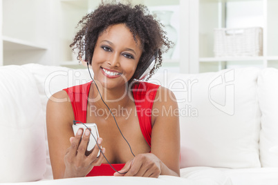 African American Girl Listening to MP3 Player Headphones