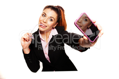 sexy businesswoman smiles for her self-portrait