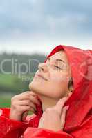 Portrait of young girl feeling the rain