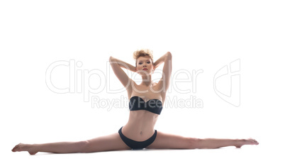 Athletic sexy woman doing stretching