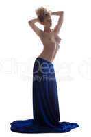 Sensual topless woman posing in long skirt