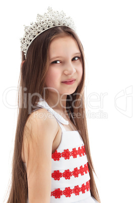 Portrait of charming little girl in crown