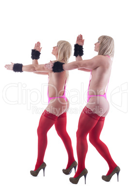 Blonde transvestites posing in red stockings