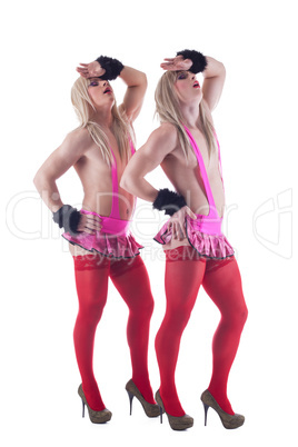 Young crossdressers posing in studio