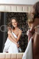 Beautiful woman smiling in mirror