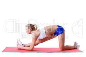 Pretty blonde doing aerobics exercises on mat