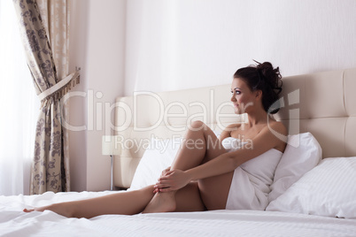 Image of beautiful woman looking at window