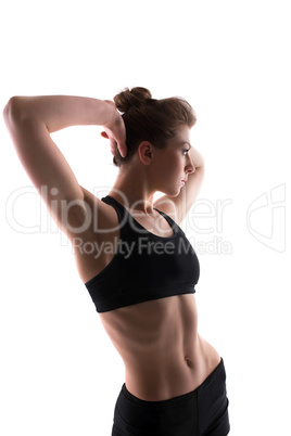 Portrait of sporty brunette posing in studio