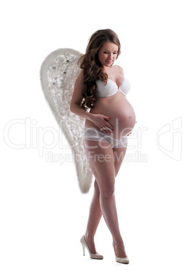 Young expectant woman with angel's wings