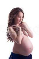 Portrait of beautiful topless pregnant woman