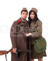 Attractive man and woman posing in khaki