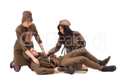 Young women soldiers makes first aid