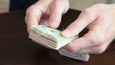Male Hands Counting Money