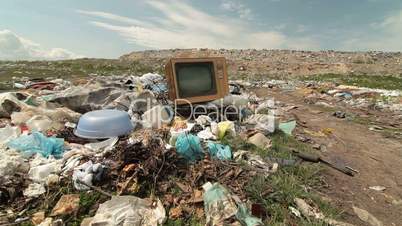 Abandoned Vintage TV On The Landfill