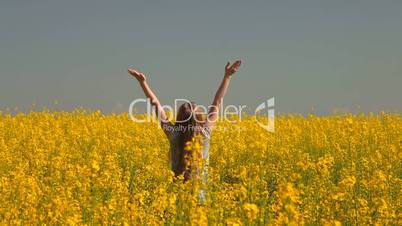 Little Girl Enjoying The Summer In Yellow Meadow