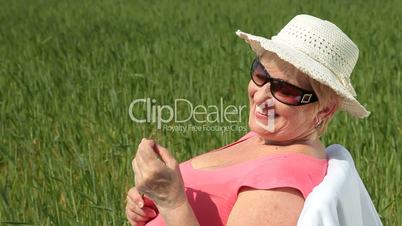 Cheerful senior woman outdoors