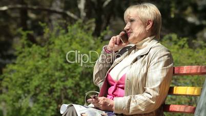 Happy Senior Woman On The Phone