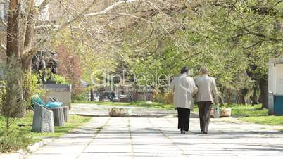 Senior women walking along the alley