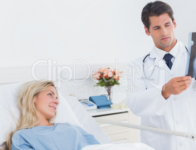 Attractive doctor showing xray