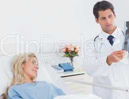 Attractive doctor showing xray