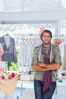 Fashion designer with arms crossed