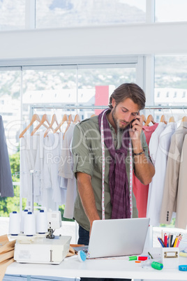 Fashion designer on the phone