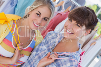 Two friends with shopping bags