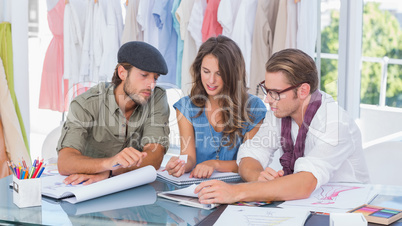 Fashion designers working in a office