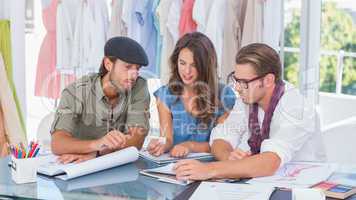 Fashion designers working in a office