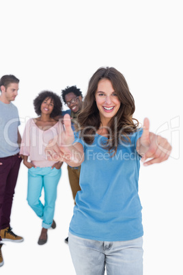 Stylish woman with thumbs up