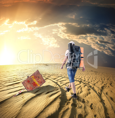 Man traveling in desert