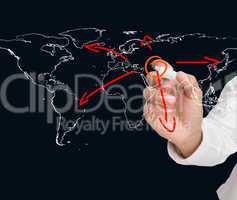 Businessman drawing world map with arrows