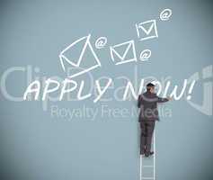 Businessman on ladder writing apply now message