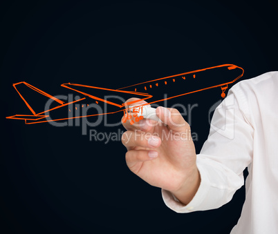 Buisnessman drawing orange airplane