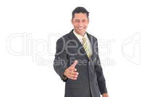 Smiling man with raised hand