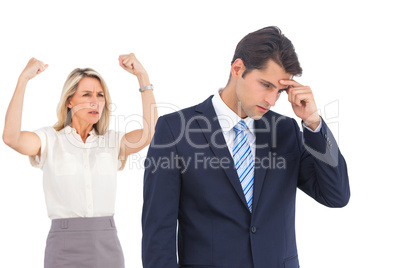 Winning businesswoman her anxious coworker