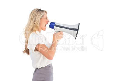 Side view of a businesswoman with megaphone