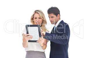 Business people looking at a pc tablet