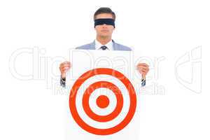 Man with blindfolded and a target